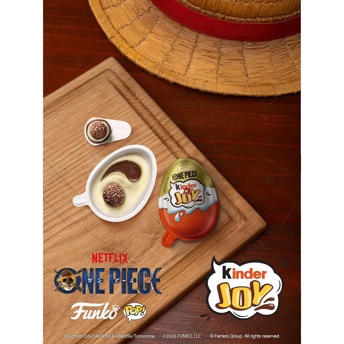 Opened Kinder Joy egg with wafer balls in milk and cocoa cream