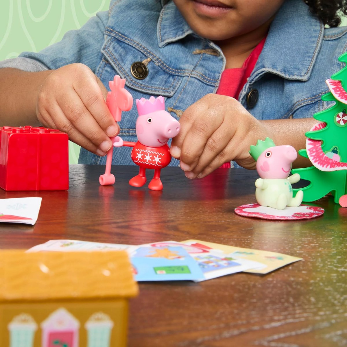 Evie figure with a rocking horse and presents